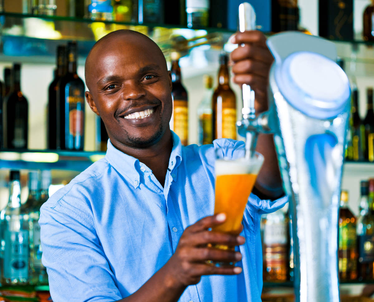 PridePays Merchant pouring a beer